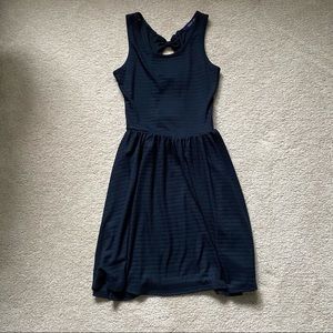 Navy blue dress with bow detailing. Size S.